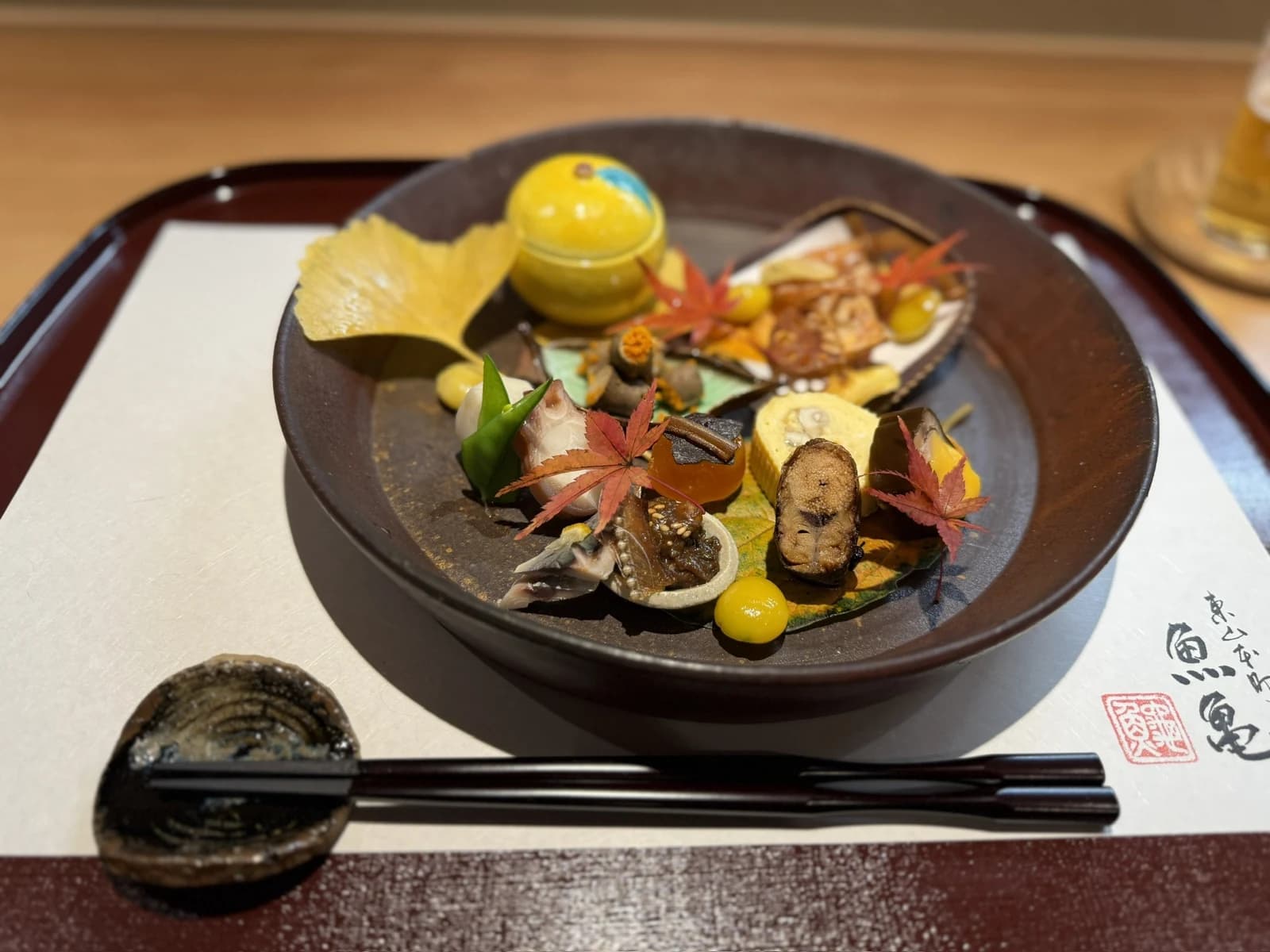 A seasonal appetizer course at Higashiyama Honmachi Uokame’s wooden counter